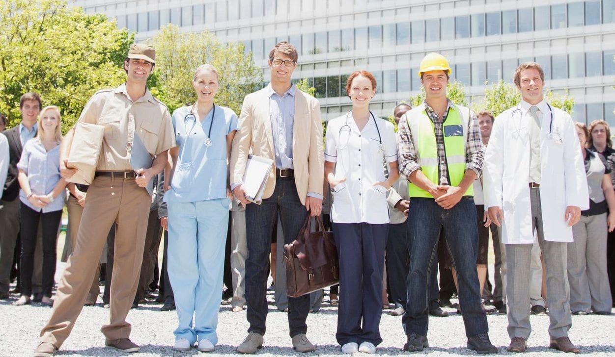 Portrait of professionals and workers with crowd of business people