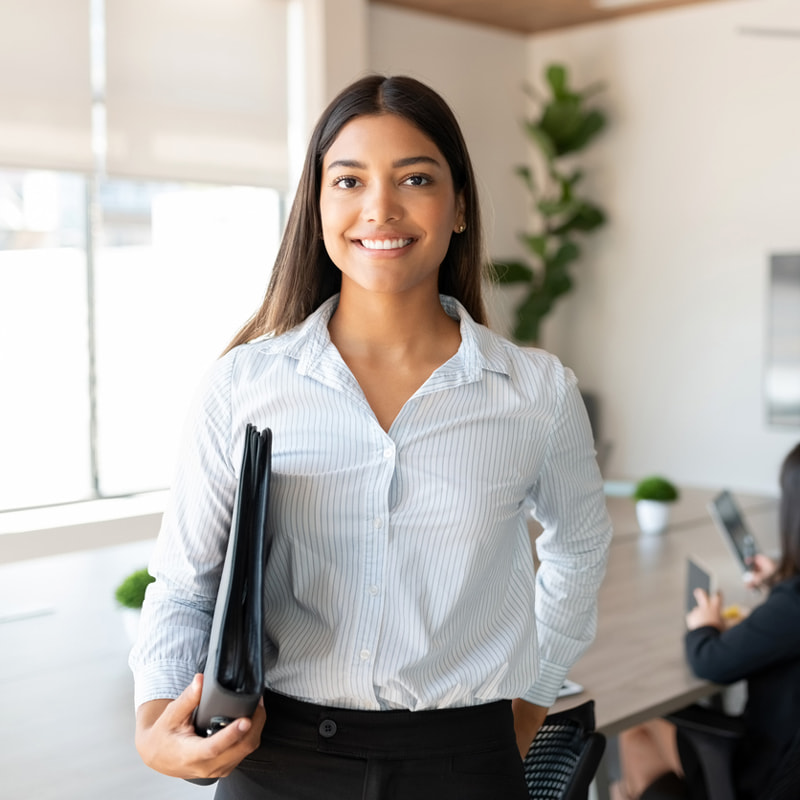 businesswoman standing in conference room
