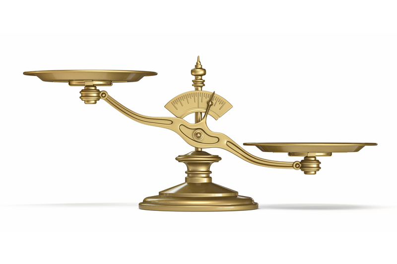 a golden scale without any items on it